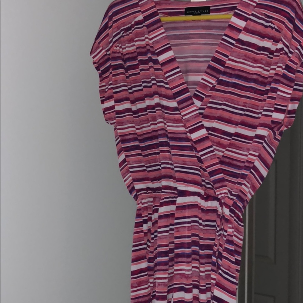 Cross body top shorts jump suit.